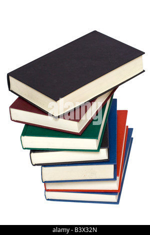 Vieux livre coloré pile isolé sur un fond blanc Banque D'Images