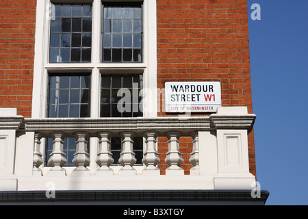 Pour une plaque de rue Wardour Street W1, Westminster, Londres, Angleterre, Royaume-Uni Banque D'Images