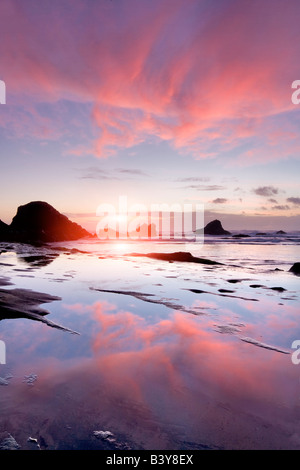 Coucher du soleil et la réflexion à Seal Rock Oregon Banque D'Images