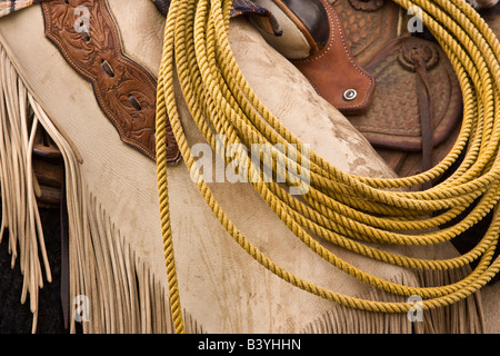 USA, Ohio, Seneca, Ranch Ponderosa. Détail de selle, chaps, et lasso. (MR) (PR) Banque D'Images