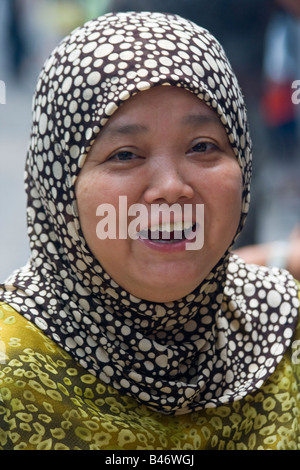 Woman Smiling dans le quartier musulman de Xian Chine Banque D'Images
