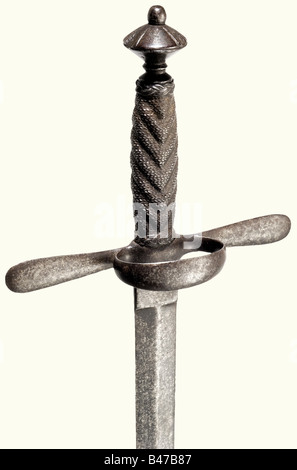 Un dagger italien de gauche, vers 1600. Lame à double tranchant avec arêtes des deux côtés (légèrement raccourcie au point), avec une marque estampillée dans le ricasso sur le côté arrière. Les quillons de fer avec une protection annulaire. Double pommeau conique ciselé avec emballage en fil de fer d'origine et embouts tressés. Longueur 43 cm. Historique, historique, XVIIe siècle, dagger, poignards, throuting, propulseurs, bâton, arme, armes, armes, armes, armes, dispositif de combat, objet, objets, photos, découpe, découpe, découpe, découpe, découpe, découpe, découpe, découpe, découpe, Banque D'Images