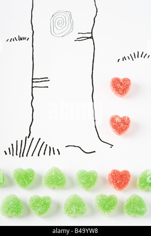Dessin et bonbons coeur de tronc d'arbre Banque D'Images