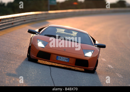 Voiture, Lamborghini Murciélago, roadster, l'année de modèle 2001-, Coupé/Cabriolet, orange , conduite, la diagonale de l'avant, vue frontale, t Banque D'Images