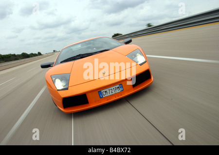 Voiture, Lamborghini Murciélago, roadster, l'année de modèle 2001-, Coupé/Cabriolet, orange , conduite, la diagonale de l'avant, vue frontale, t Banque D'Images