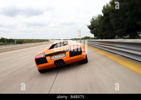 Voiture, Lamborghini Murciélago, roadster, l'année de modèle 2001-, Coupé/Cabriolet, orange , conduite, la diagonale de l'arrière, vue arrière, test Banque D'Images