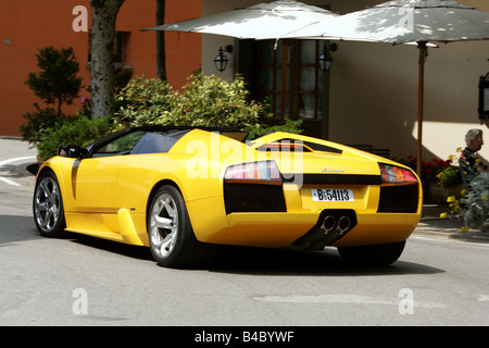 Voiture, Lamborghini Murcielago Roadster, l'année de modèle 2004-, jaune, convertible, open top, debout, à la défense, la diagonale du ba Banque D'Images