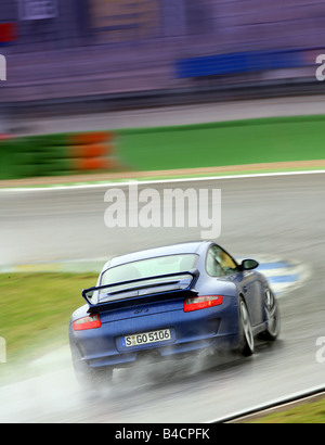 Porsche 911 GT3, l'année de modèle 2006- bleu, déménagement, la diagonale de l'arrière, vue arrière, test track, DRIFT, DRIFTING Banque D'Images