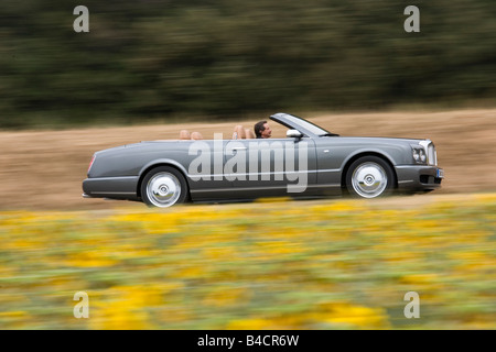 Bentley Azure, l'année de modèle 2006-, l'anthracite, la conduite, la vue latérale, country road, open top Banque D'Images