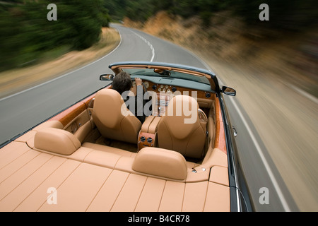 Bentley Azure, l'année de modèle 2006-, anthracite, conduite, panoramique plan , vue du conducteur, verwischt, country road, open top Banque D'Images