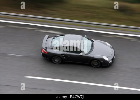 Porsche 911 Turbo, l'année de modèle 2006-, noir, la conduite, la vue latérale, test track Banque D'Images