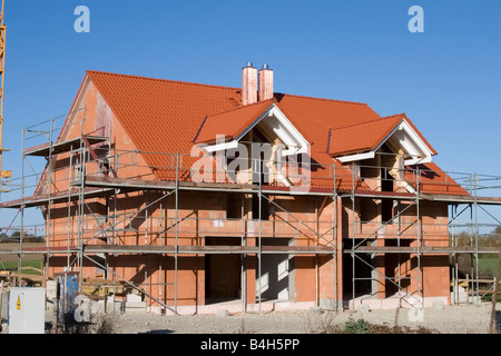 Échafaudages sur maison en construction Banque D'Images