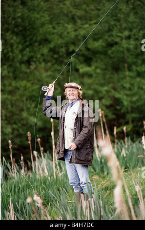 Chris Tarrant Capital Radio disc-jockey et présentateur de télévision à pêche pêche Mai 1995 Lakedown Banque D'Images