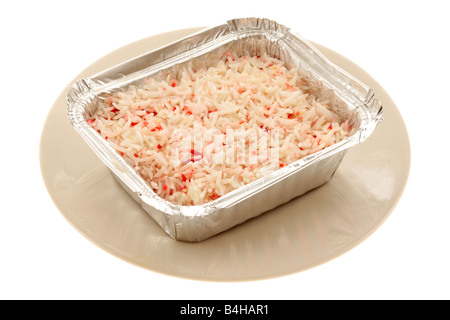 Des plats à emporter indien savoureux Riz Pilau coloré Ordre côté isolés contre un fond blanc avec un chemin de détourage et aucun peuple Banque D'Images