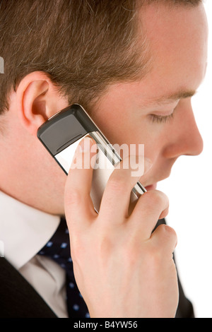 Businessman Talking On Mobile Phone Banque D'Images