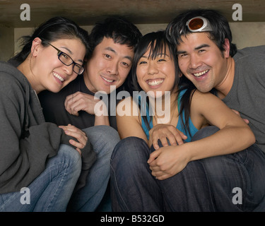 Multi-ethnic friends smiling Banque D'Images