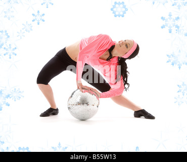 Photo de dancer girl avec glitterball et snowflakes Banque D'Images