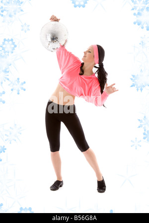 Photo de dancer girl avec glitterball et snowflakes Banque D'Images