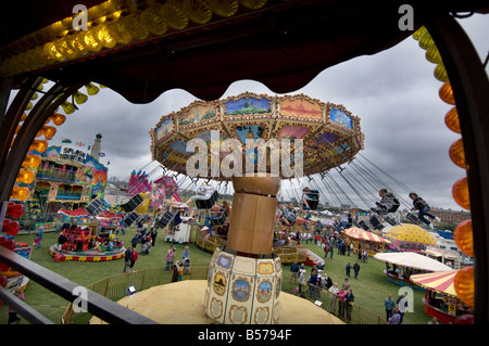 Les vacanciers s'amuser sur une chairoplane ride sur Southsea Common Portsmouth UK Banque D'Images