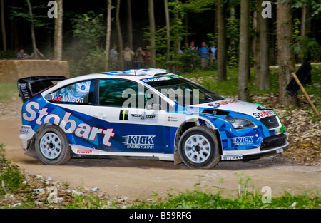 2007 Stobart Ford Focus WRC avec chauffeur Matthew Wilson sur la scène de la forêt à Goodwood Festival of Speed, Sussex, UK. Banque D'Images