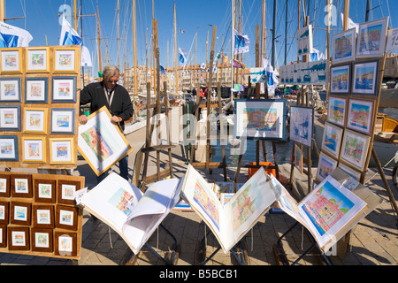 Aquarelles sont exposés à la vente sur le port de Saint-Tropez sur la Cote d'Azur / Provence / Sud de la France Banque D'Images