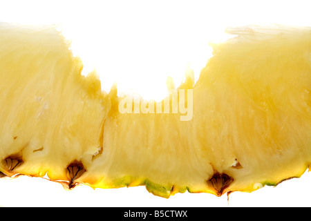 Tranche d'ananas d'or avec une bouchée de marque Banque D'Images