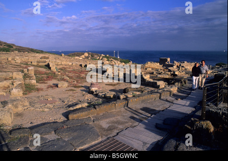 Ruines romaines de punique ville fondée par les Phéniciens en 730 av. J.-C. à Tharros, sur la côte de la péninsule de Sinis, Sardaigne, Italie Banque D'Images