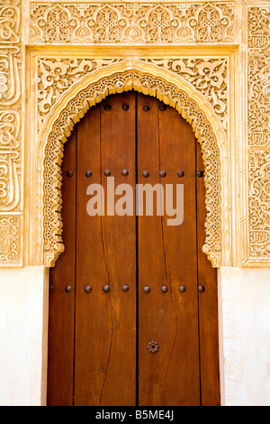 Moorish door at the Patio de Arrayanes (Court of the Myrtles) in La Alhambra in Granada, Spain. Stock Photo