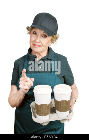Un travailleur dans un café avec colère face à un client difficile Banque D'Images