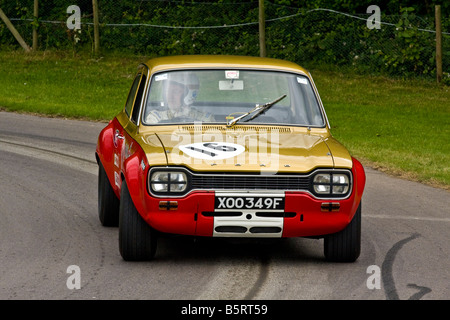 1968 Alan Mann Ford Escort Twin Cam avec chauffeur Sir John Whitmore à Goodwood Festival of Speed, Sussex, UK. Banque D'Images