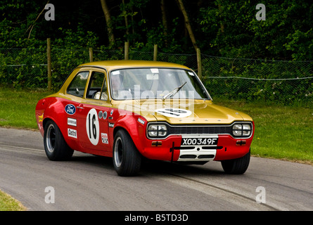 1968 Alan Mann Ford Escort Twin Cam avec chauffeur Sir John Whitmore à Goodwood Festival of Speed, Sussex, UK. Banque D'Images