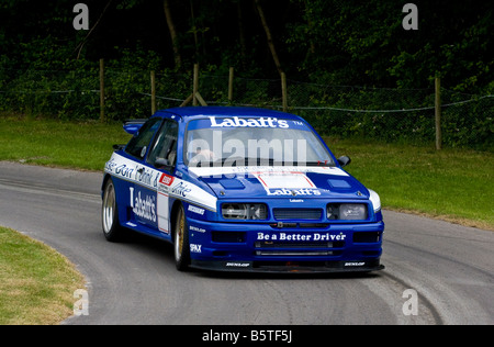 1990 Ford Sierra RS500 concurrent BTCC avec chauffeur Greg Rose à Goodwood Festival of Speed, Sussex, UK. Banque D'Images