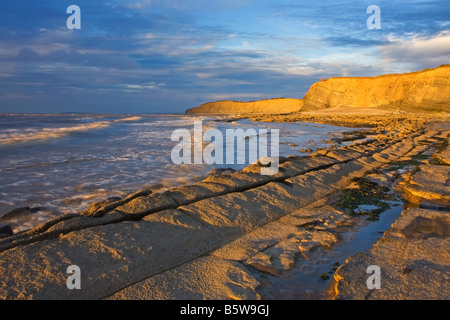 Plage de Kilve juste avant le coucher du soleil. Banque D'Images