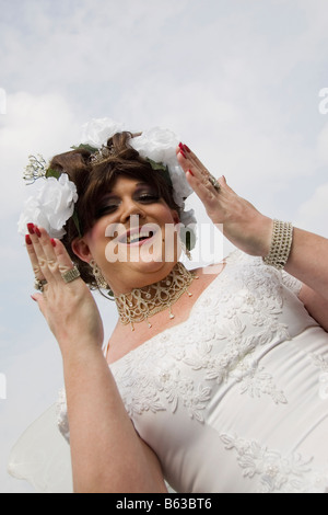 Low angle view of a gay man blowing a kiss Banque D'Images