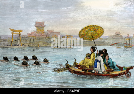 Mesdames sur un bateau japonais de l'ancien régime tiré par les nageurs. À la main, gravure sur bois Banque D'Images