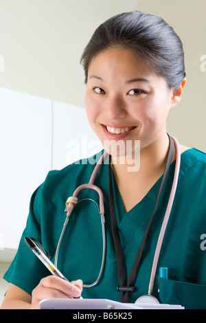 Portrait of a smiling nurse. Votre 'next', dit-elle. Banque D'Images