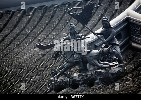 Les statues sur le toit, Jardin de Yu Yuan, Shanghai, Chine Banque D'Images