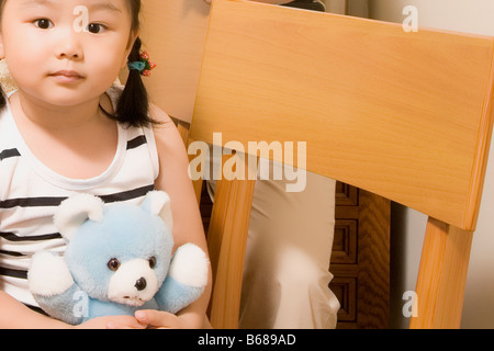 Close-up of a Girl holding a toy Banque D'Images