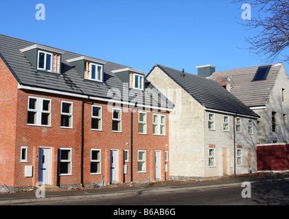 En partie construit des maisons sur un chantier de construction. Banque D'Images