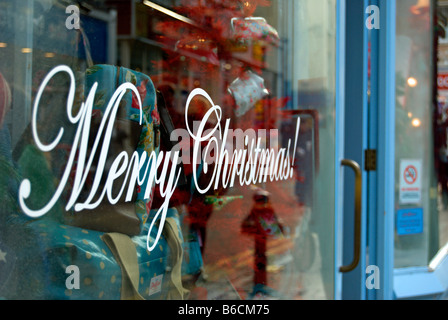 Joyeux noël message d'une vitrine, à Kingston upon Thames, Surrey, Angleterre Banque D'Images