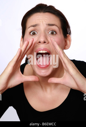 Jeune femme criant Banque D'Images