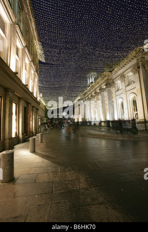 Ville de Glasgow, en Écosse. Glasgow's Royal Exchange Square à Noël. Banque D'Images