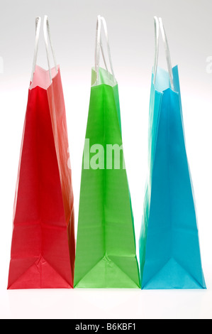 Des sacs de papier coloré trois Banque D'Images