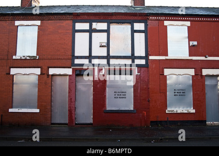 Maisons placardées, Charlestown/ Abaisser Kersal domaine de Salford, Greater Manchester, UK Banque D'Images