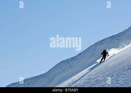 Ski de randonnée dans le parc national des Glaciers, MT. Banque D'Images