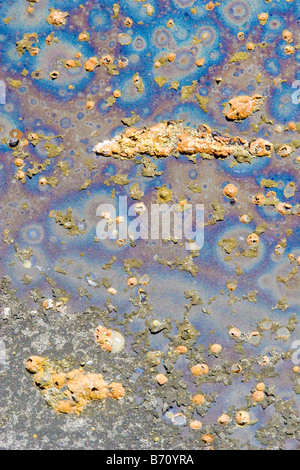 Abstract Background texture de métal rouillé dans les tons de bleu et orange Banque D'Images