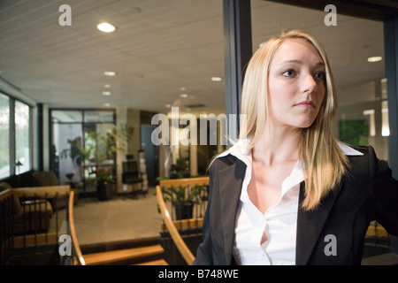 Close-up of young office worker in workplace Banque D'Images