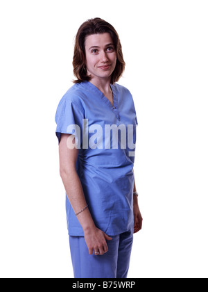 Female professionnel de santé dans Scrubs against White Background Banque D'Images