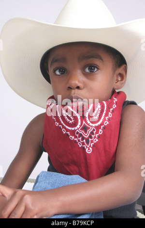 African American boy playing cowboy Banque D'Images