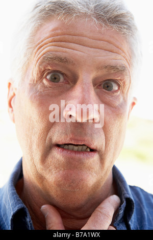 Portrait de l'homme d'âge moyen à la surprise Banque D'Images